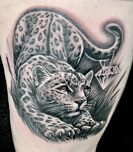 Work by Atomic Garden Tattoo