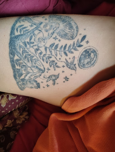 Work by Woodys Old School Tattoos and Piercings