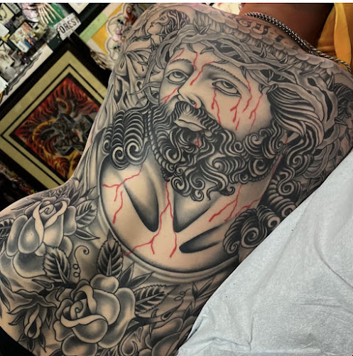 Work by Consolidated Tattoo Parlour
