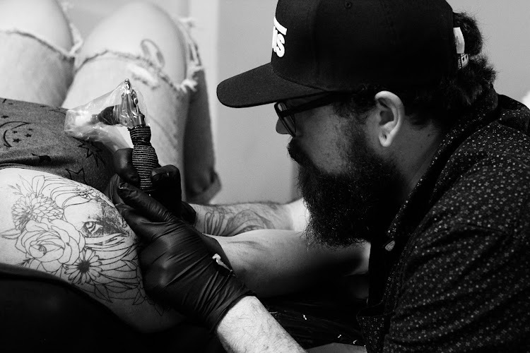 Work by Iron Crow Tattoo Co.