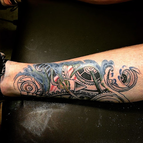 Work by Kinetic Ink Tattoo Company