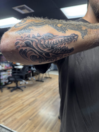 Work by Dark Moth Tattoo