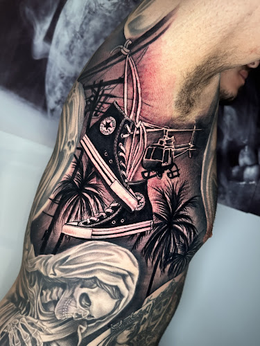 Work by Diverse Illusions Tattoo 2