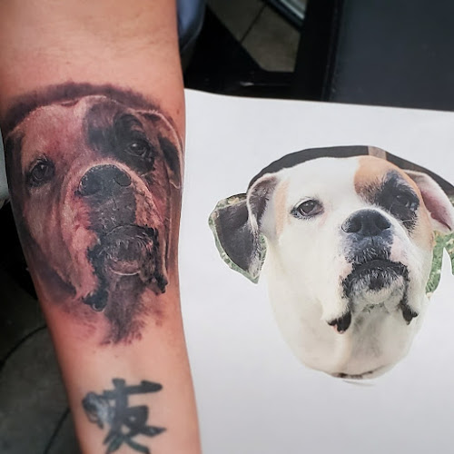 Work by Blue Crab Tattoo and Body Piercing