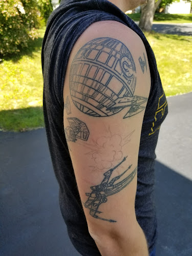 Work by Golden Monkey Tattoo