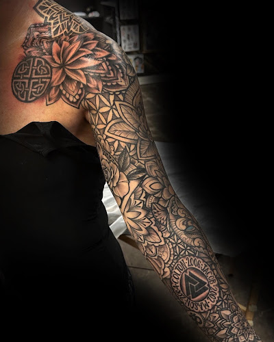 Work by Red Rose Tattoo