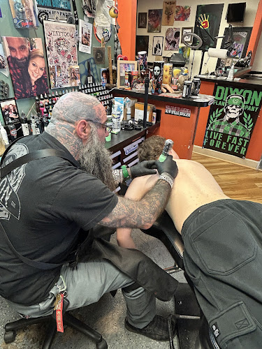 Work by All American Tattoo