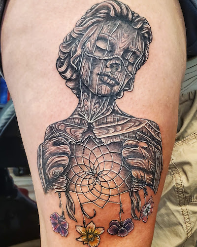 Work by Emerald Buddha Tattoo