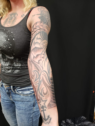 Work by Hawk's Tattoos