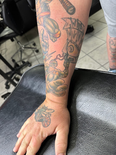 Work by From the Ashes Tattoo Studio