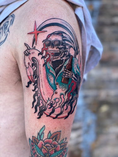 Work by Hole In the Wall Tattoos and Piercing, LLC