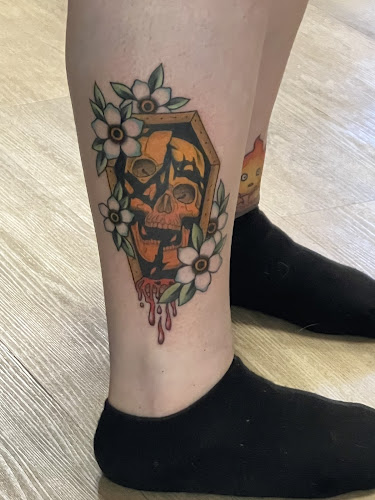 Work by Holy Iron Tattoo & Piercing