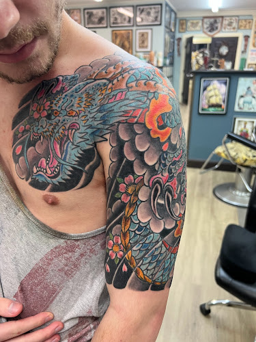 Work by AC/ Revenge Tattoo/ American Craft Art Services LLC