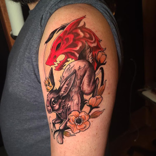 Work by Zodiac Lines Tattoo Co.