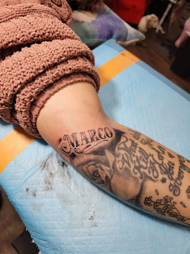 Work by Fedora Tattoo and Piercing