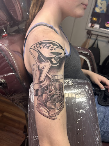 Work by Heart Luck Tattoo Company