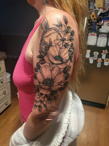 Work by Rooster Tattoo