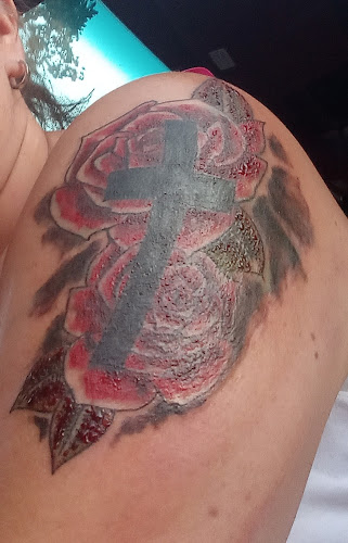 Work by Outhouse Tattoo