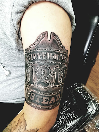 Work by Main Street Tattoo On Woodruff