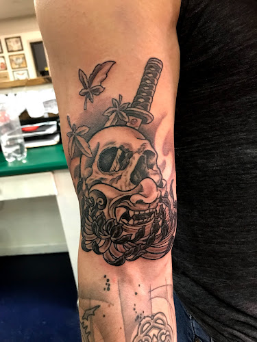 Work by Blood Money Tattoo Studio