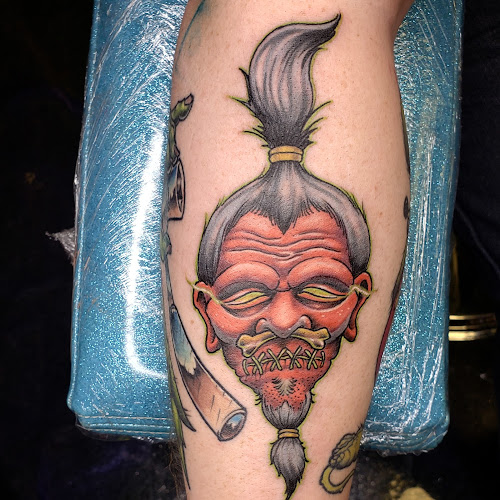 Work by Tomahawk Tattoo MD