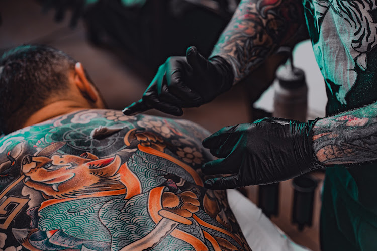 Work by Outlook Tattoo
