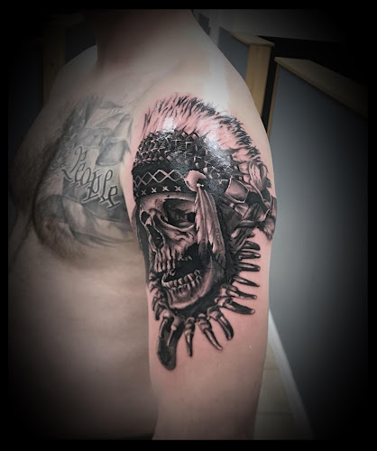 Work by Revelation Tattoo and Piercing