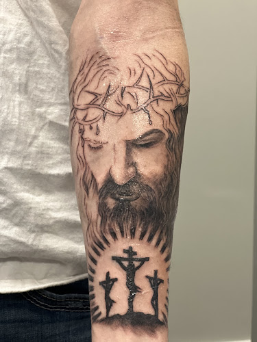 Work by Happy Tattoos