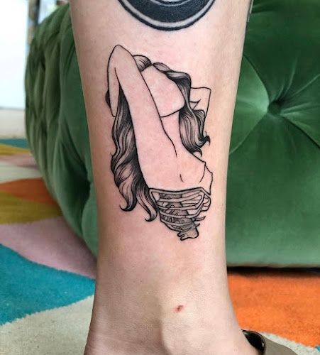 Work by Refuge Tattoos