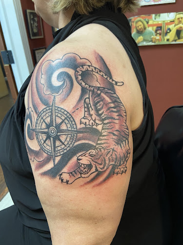 Work by Dead Last Tattoo Co