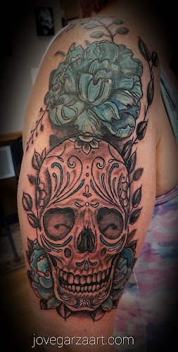Work by Outlaw Ink Custom Tattoos LLC