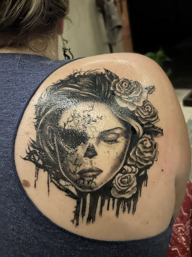 Work by Raven’s Nest Tattoo and Galleries