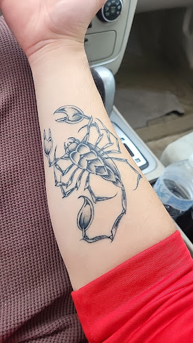 Work by Green Rose Tattoo