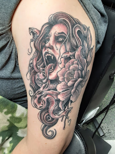 Work by Sin in Skin Tattoo Collective