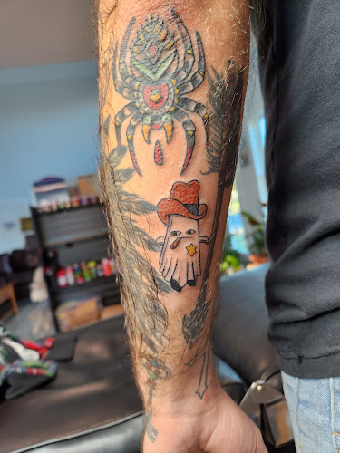 Work by Synchronicity Tattoo Studio Llc