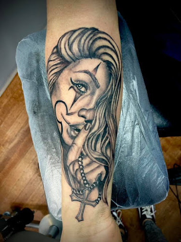 Work by Twisted Canvas Tattoo and Art Studio