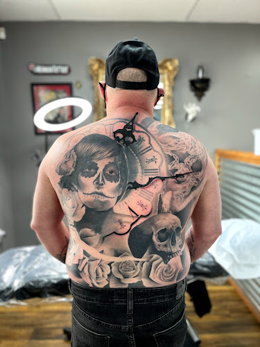 Work by Golden Dagger Tattoos and Piercings