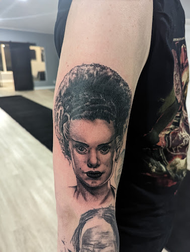 Work by Night Owl Tattoo