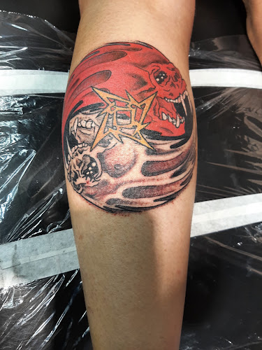 Work by Point Blank Tattoo