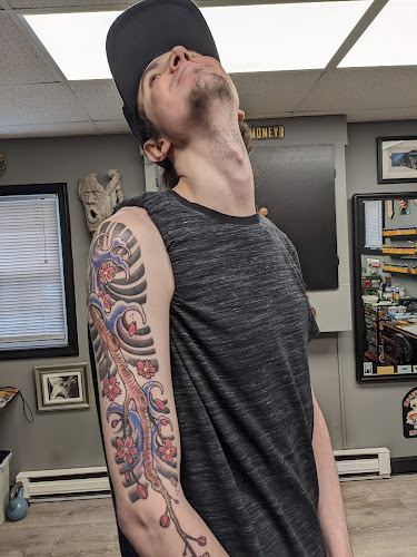 Work by Lucky Frog Tattoo