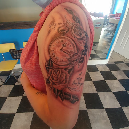 Work by Time Machine Tattoo