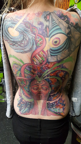 Work by Big Mojo Tattoo & Body
