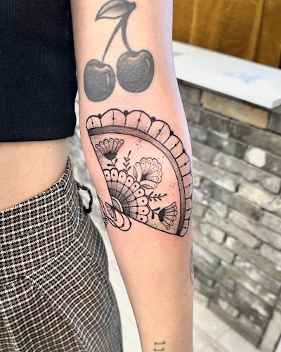 Work by Brass Horse Tattoo