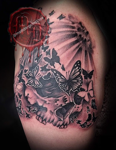 Work by Bombs Away Tattoo