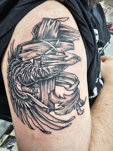 Work by Classic Tattoo Inc