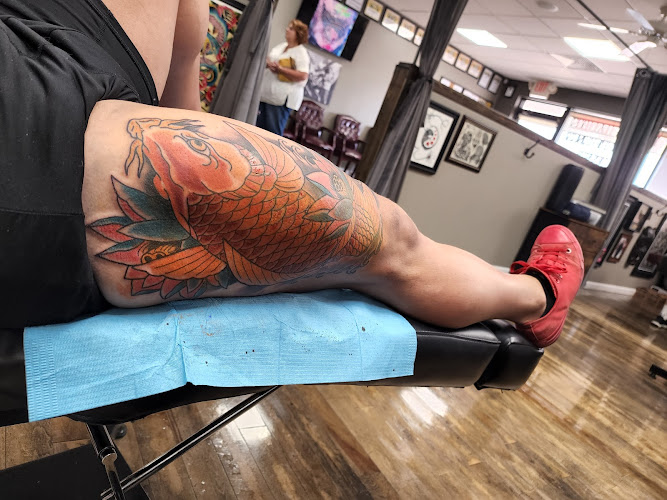 Work by Newage Tattoos and Body Piercings