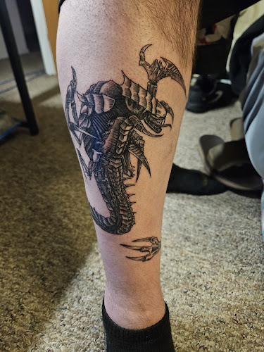 Work by Total Commitment Tattooing