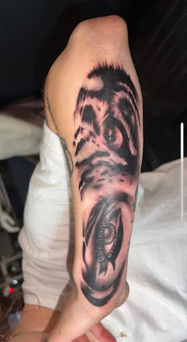 Work by Hamlin Wolcott Tattoos and Piercings