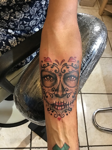 Work by Burning Lotus Tattoo