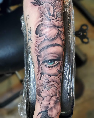 Work by Divine Tattoo Parlor